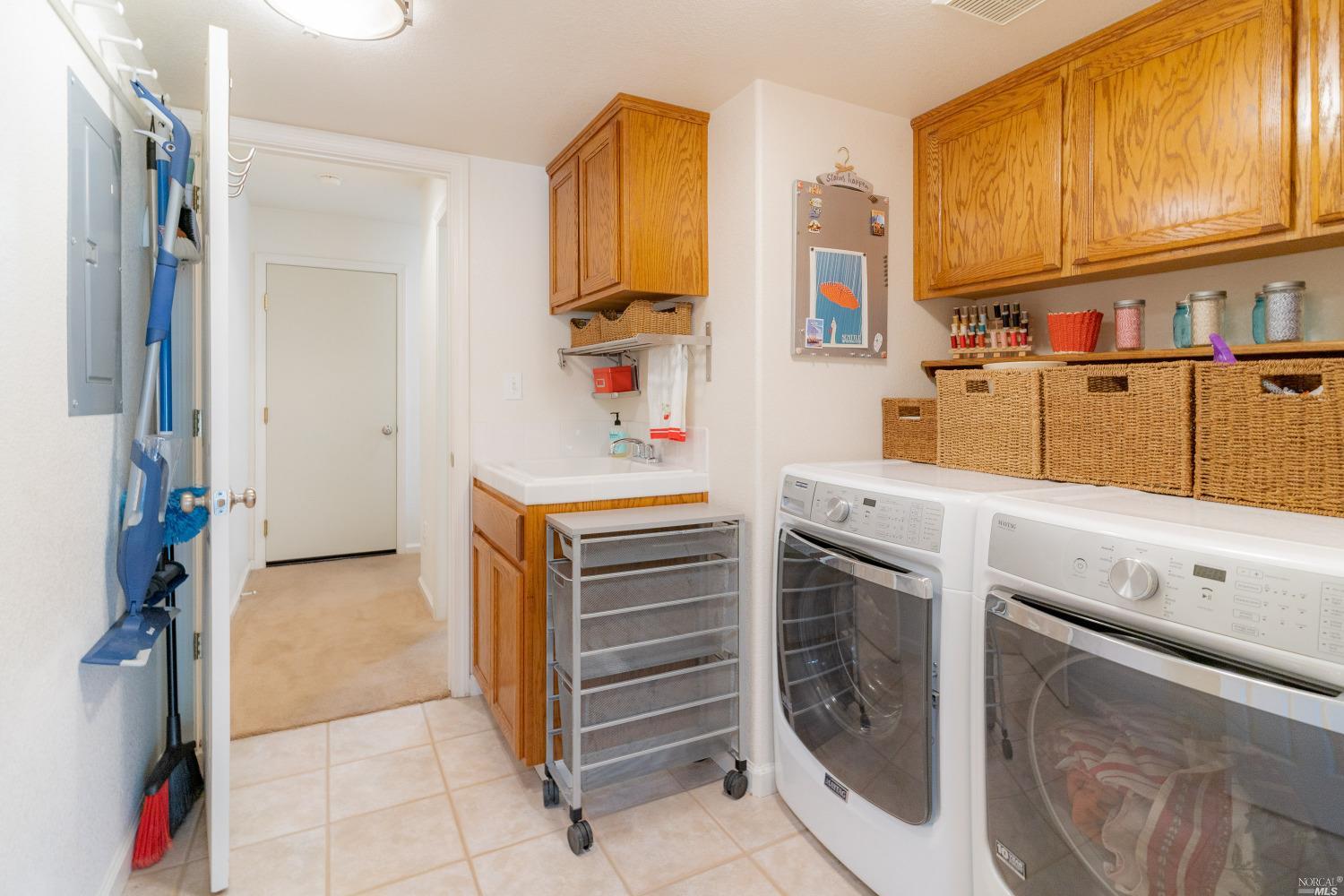 Indoor Laundry Room  with a sink and Washer & Dryer Included!