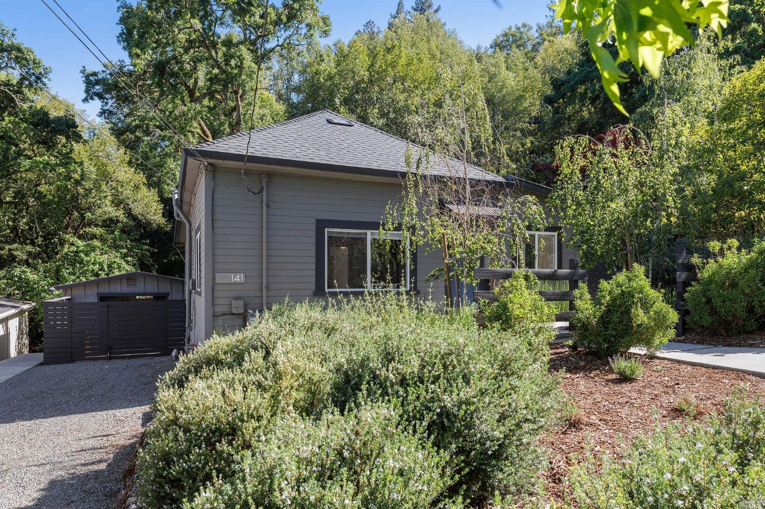 Don't miss the opportunity to own 2 homes on a large, sunny lot in beautiful San Anselmo! The detached houses have substantial separation providing excellent privacy, each with their own sun drenched patios and outdoor space.  The main house, 1032 sqft, 2BR/2BA, has a stand alone garage providing 350 sqft of space for artist or yoga studio, storage and more.  With southern exposure receiving all day sun, the lovely outdoor space includes a patio, yard, bocce court and raised flower beds.  The rear cottage is out of a story book, on magical private woodland gardens with a year round running creek.  Accessible via footbridge, 2nd house is 578 sqft 1BR/1BA and was remodeled in 2020 to modern living standards while maintaining the home's charm. Features include an entry patio, large craft studio on lower level and the bedroom has beautiful views and a terrace.  Property has a crushed bluestone driveway with plenty of on street parking available.  Classified multi-family, this property presents great opportunities as an investment property or for first time home buyers, rent out the cottage to offset your mortgage payment.  Consistent rental history.  Not in a flood zone!  Close to great schools, biking and hiking trails, downtown San Anselmo and Fairfax, 141 Scenic is a must see!