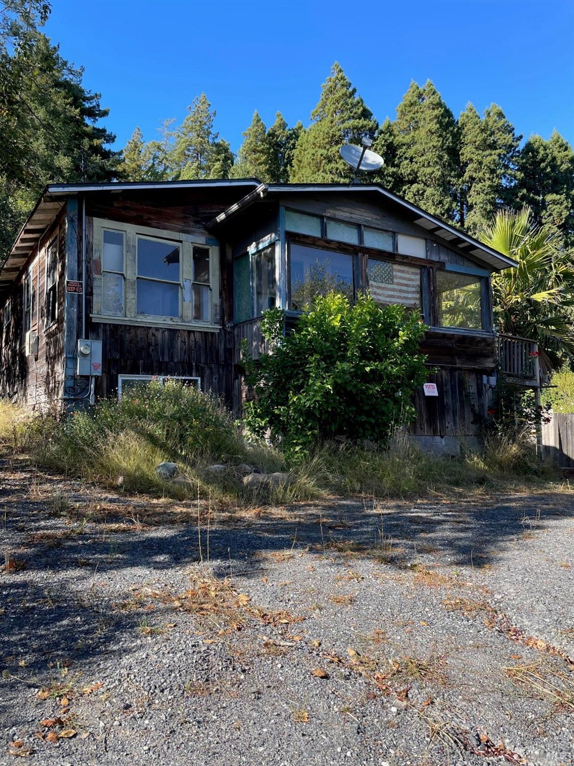 Built in 1916, Spring feed water source. just  under 1/2 acre. Two bed one bath . Views, solar. First time on market since 1977.Court approved probate sale. Major Fixer.