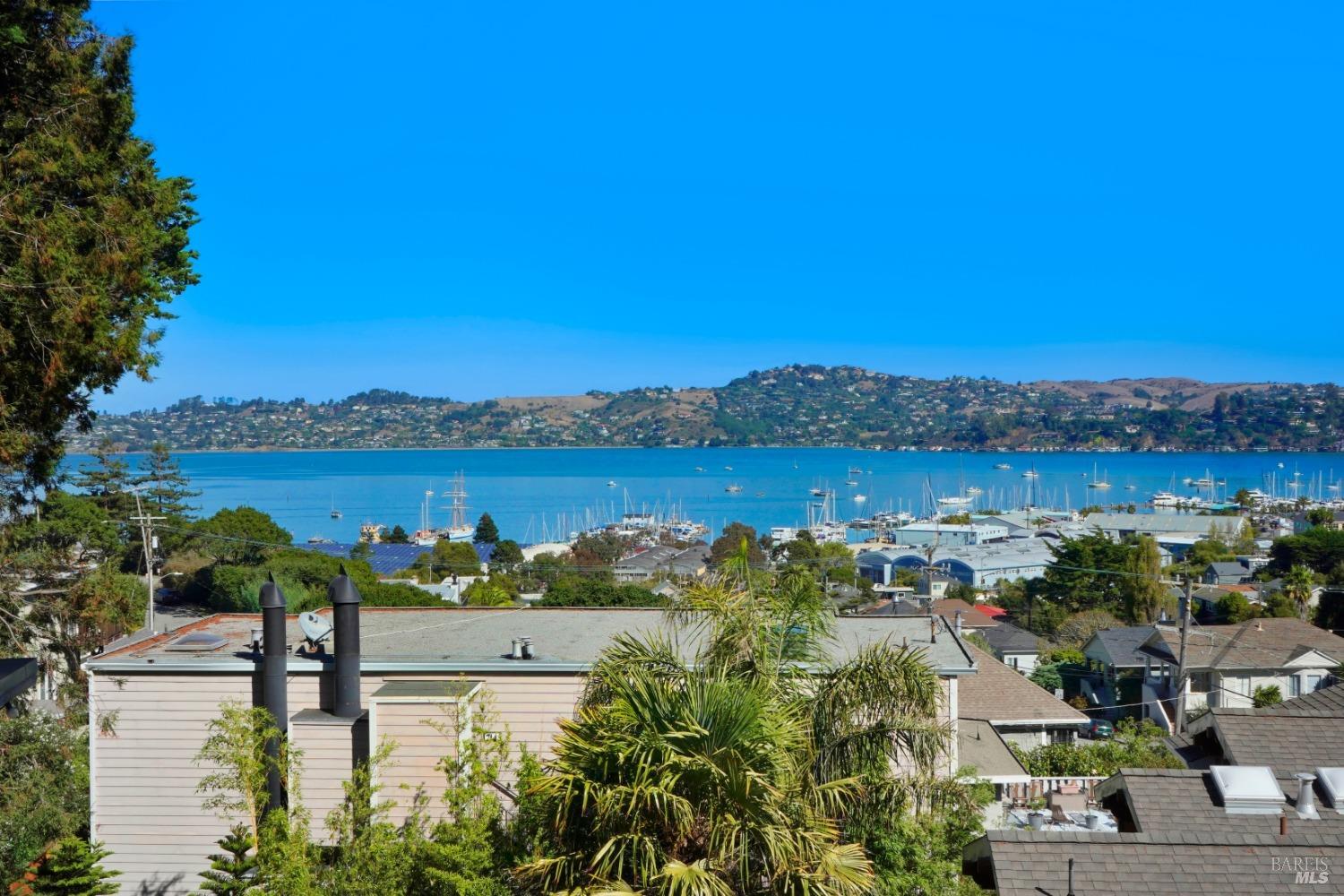 Amazing investment fixer opp with exceptional views of the Sausalito Bay! Two homes with 3 units on the same lot. Sitting on a quiet dead end corner of Spring and Gordon streets in Woodward Valley. 720 Spring Street is a '40s era 2bd 1bth summer cottage about 725 sqft, has views of the Bay from the livingroom and porch, a large back deck with an enclosed washer dryer, can be expanded to ADU 1000 sqft, and the tenants pay $3,500. 8 Gordon is a '60s era 2-story house that was made into a duplex: 8A is the vacant upstairs 2bd 1.5bth with a beautiful expansive view and separate garage that rented for $4,400. This prime unit could be updated and expanded to create a large master suite. 8B is the lower and large 1bd unit that has been freshly remodeled and rented for $1,500. Both two units have their own W/D but share utilities. The property has a lot of deferred maintenance including replacing the sewer laterals.