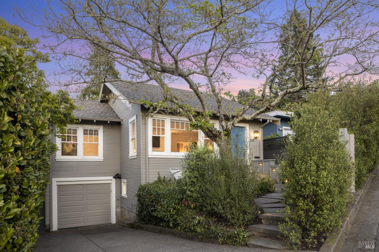 Located in the highly desirable Chapman Park neighborhood of Corte Madera, this endearing turnkey special home features 3BR+/2BA and is ideal for the active indoor/outdoor California lifestyle. Upon entering the front gate, a stone pathway leads to the front entry Dutch door as it welcomes you into this sun-filled vintage charmed home with modernized amenities that has been meticulously maintained. The renovated chef's kitchen is properly equipped with stainless steel appliances, including Wolf gas range, stone counters and offers convenient direct access to the deck and outdoor gardens. The sunny tranquil private gardens serve as an extension of the home, offering multiple enjoyable areas for relaxation and comfortable at-home living. Gather around the gas fire pit while hosting family and friends, and appreciate the surrounding manicured landscaped gardens, enhanced by elegant outdoor lighting and beautiful bluestone patios. In addition, the versatile bonus room with full bathroom located off the garden is perfect for home office, gym or visiting guests. Expansive storage room, laundry and 1-car garage plus driveway parking, complete this home. Top public schools, prime commute location, close proximity to shopping, parks and world-class hiking/biking. Move right in and enjoy!