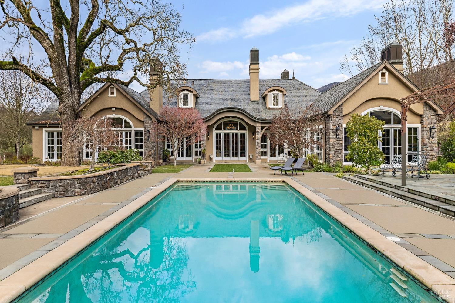 Indulge in the quintessential Napa Valley lifestyle with this extraordinary 21-acre estate nestled i