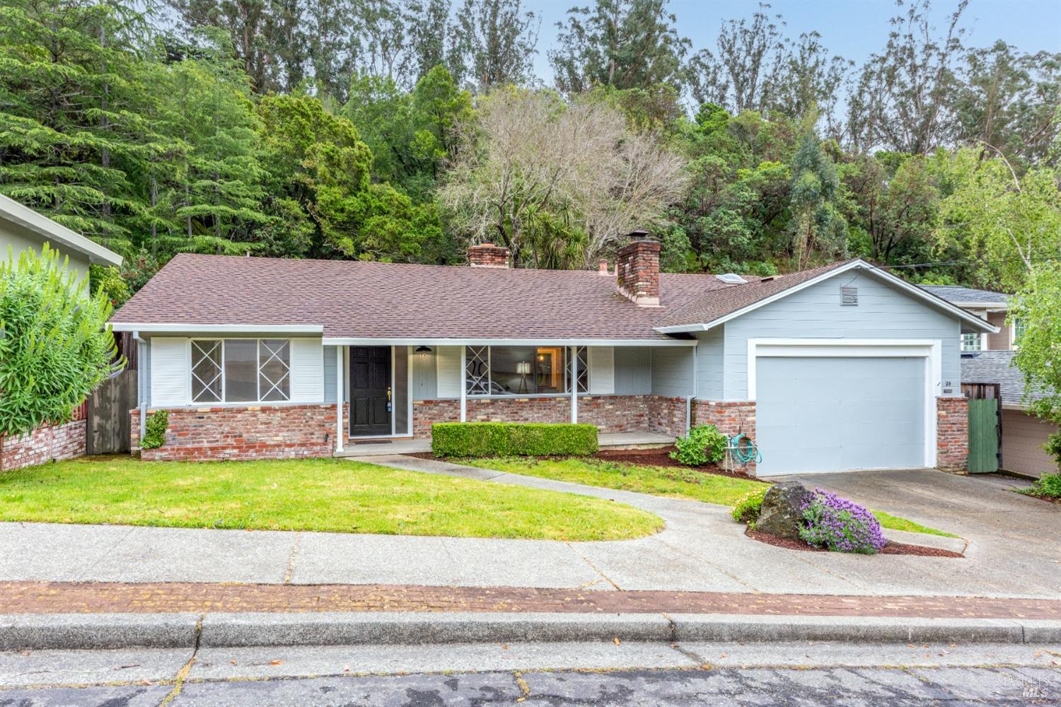 Tucked away in the sought-after Marinda Oaks neighborhood, this charming single-level home instantly wraps you in its cozy embrace the moment you walk through the front door. With its classic ranch style, it boasts newly refinished hardwood floors, fresh paint inside and out, and brand-new carpet in the family room.  Indulge in the warmth of one of the two fireplaces, conveniently situated in both the living room and the family room. Adjacent to the family room lies the inviting dining area, seamlessly connected to the backyard. The expansive backyard, adorned with mature trees, provides an ideal setting for entertaining guests, unwinding, or simply embracing the beauty of nature.  Featuring three bedrooms, two full bathrooms, and a separate large laundry/mud room with plenty of storage, this home combines comfort and convenience effortlessly. Unwind by indulging in a steam shower experience in the primary bathroom. Just steps away awaits downtown Fairfax, where you can immerse yourself in a dynamic nightlife scene, savor mouthwatering cuisine, enjoy a movie night out, or explore the bustling farmers' markets. It's no wonder Marinda Oaks holds a special place in the hearts of its residents!