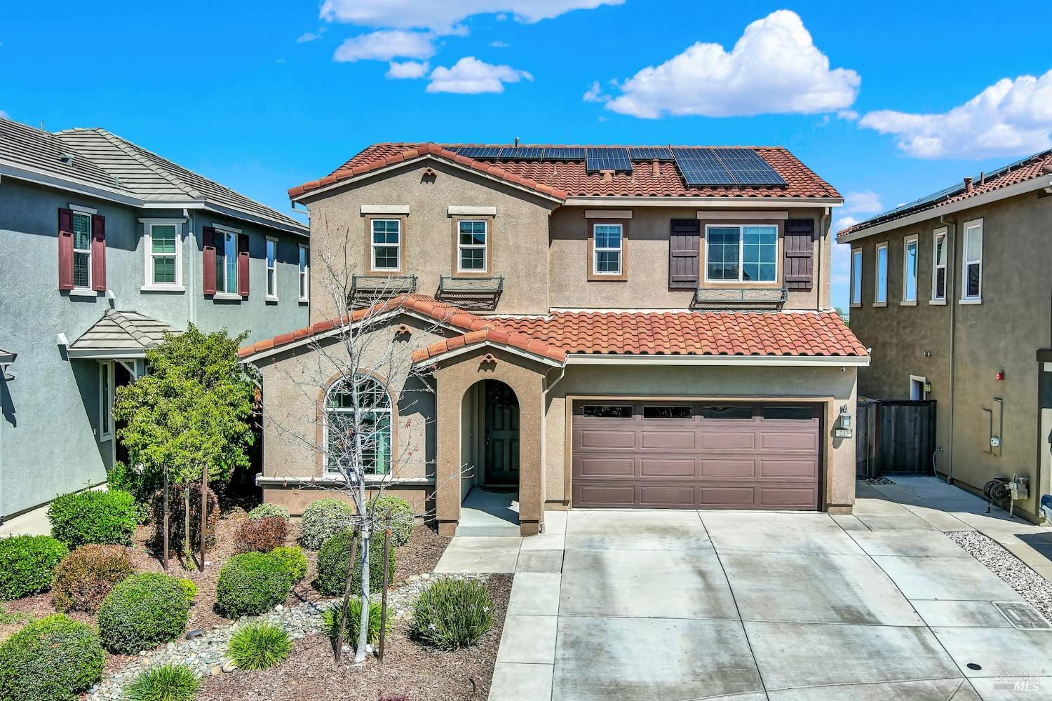 Nestled in the Vanden Ranch community, this exceptional home harmoniously combines modern sophistica