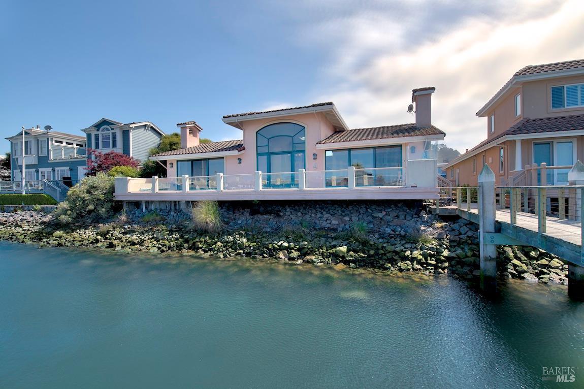 Unique opportunity to live in gated Timmers Landing location in Paradise Cay, Tiburon. One level wit