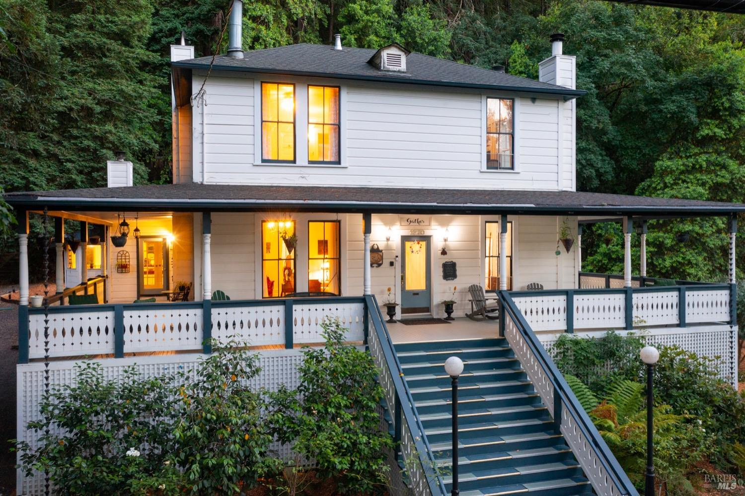 Discover this stunning, tastefully renovated 1890s classic Victorian farmhouse across a small bridge and picturesque creek on 2 acres of Redwood Grove in the Russian River Valley. Charming wrap-around deck, perfect for savoring the Russian River's tranquil summers and fall weather. The home has a decades-long history as a 5-star rated Bed & Breakfast and is operated as a licensed vacation rental. The Recreation K Zone allows for commercial or residential usage and has been used as both. The main home boasts 5 bedrooms, 5.5 bathrooms, and 6 fireplaces, plus a formal living room, dining room, library, chef's kitchen, breakfast nook, office/recreation room, and laundry room. An additional 1BD/1BA cottage can house guests or act as an exterior office. Private parking for 10 cars. The relaxing yard boasts a hot tub, outdoor shower, dry sauna, and picnicking areas. The region is a wine lover's paradise due to access to hundreds of large and small vineyards (eg, Korbel, Hartford, Deloach, Gary Farrell, Iron Horse, La Crema). Ideally located 5-10 min away from top Sonoma County restaurants in Guerneville, Forestville, Occidental, Healdsburg; Armstrong Woods; Russian River beaches; 15 min to SoCo Airport, 20 min to Hwy 1 and Sonoma Coast (Jenner, Goat Rock, Bodega Bay).