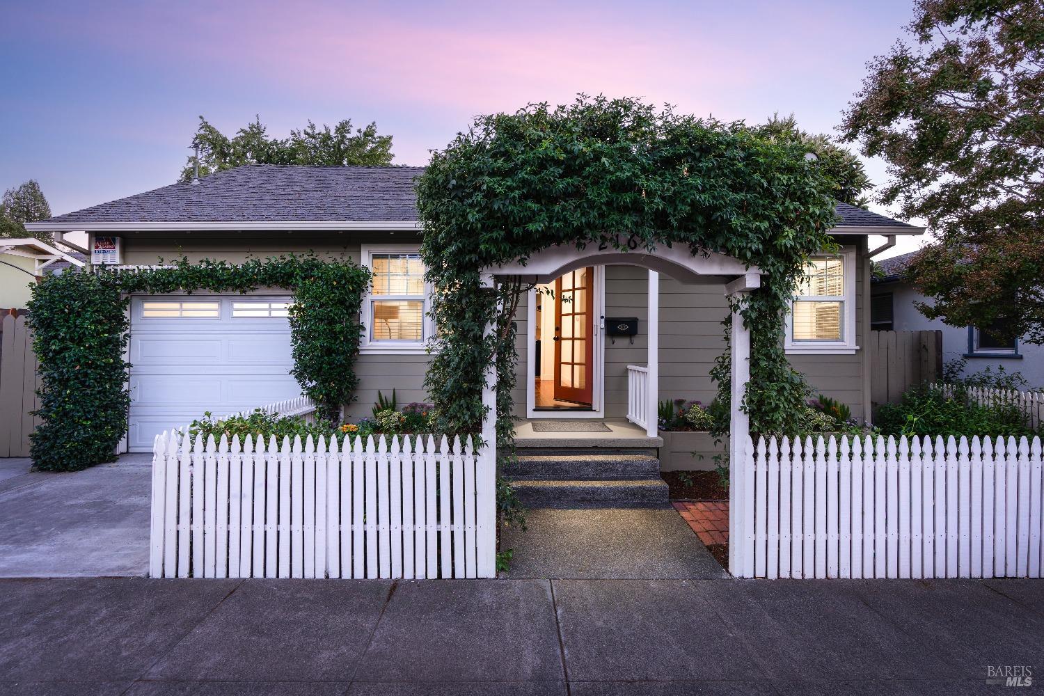 Just steps from Healdsburg's iconic plaza, this charming 2-bedroom, 1-bathroom home offers a rare opportunity to enjoy downtown living at its finest on one of the best streets in Healdsburg. The inviting living room, complete with a cozy fireplace, is perfect for quiet evenings or entertaining guests. A separate extra room provides an ideal space for a home office or creative studio, catering to modern needs. Outside, the expansive, private backyard is a peaceful retreat, featuring fruit trees and garden beds, offering endless possibilities for gardening or outdoor relaxation. This home presents a unique chance to embrace Healdsburg's vibrant lifestyle while enjoying the tranquility of your own secluded oasis.