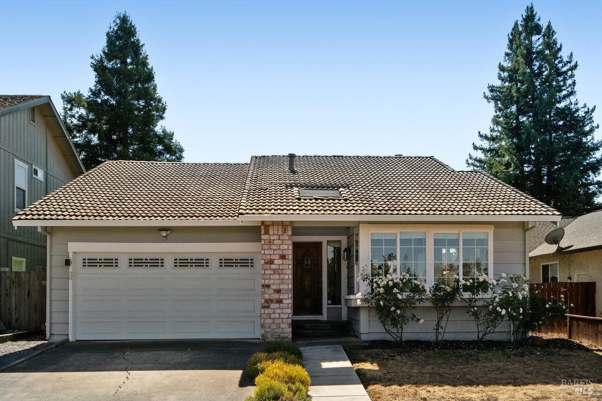 Sweet home Petaluma! Located across the street from Bond Park, this adorable 3 bedroom and 2 bathroom single level home is ready for new owners. Open concept living and dining areas are filled with natural light and vaulted ceilings. The beautifully updated kitchen with a large marble-topped island opens to the family room with a slider leading to the backyard. Level and spacious, the yard has raised beds for gardening, grass for kids and pets, and room to add a hot tub or play structure. The primary bedroom has an ensuite bathroom with walk-in shower. The additional two bedrooms share a bathroom with shower over tub. The home has updated lighting throughout and a new furnace. Close to shopping, schools, public transportation, and just a few minutes to Hwy 101, 30 minutes to the coast, 30 minutes to Southern Marin. Come tour this property in person to appreciate its charm and the wonderful neighborhood.