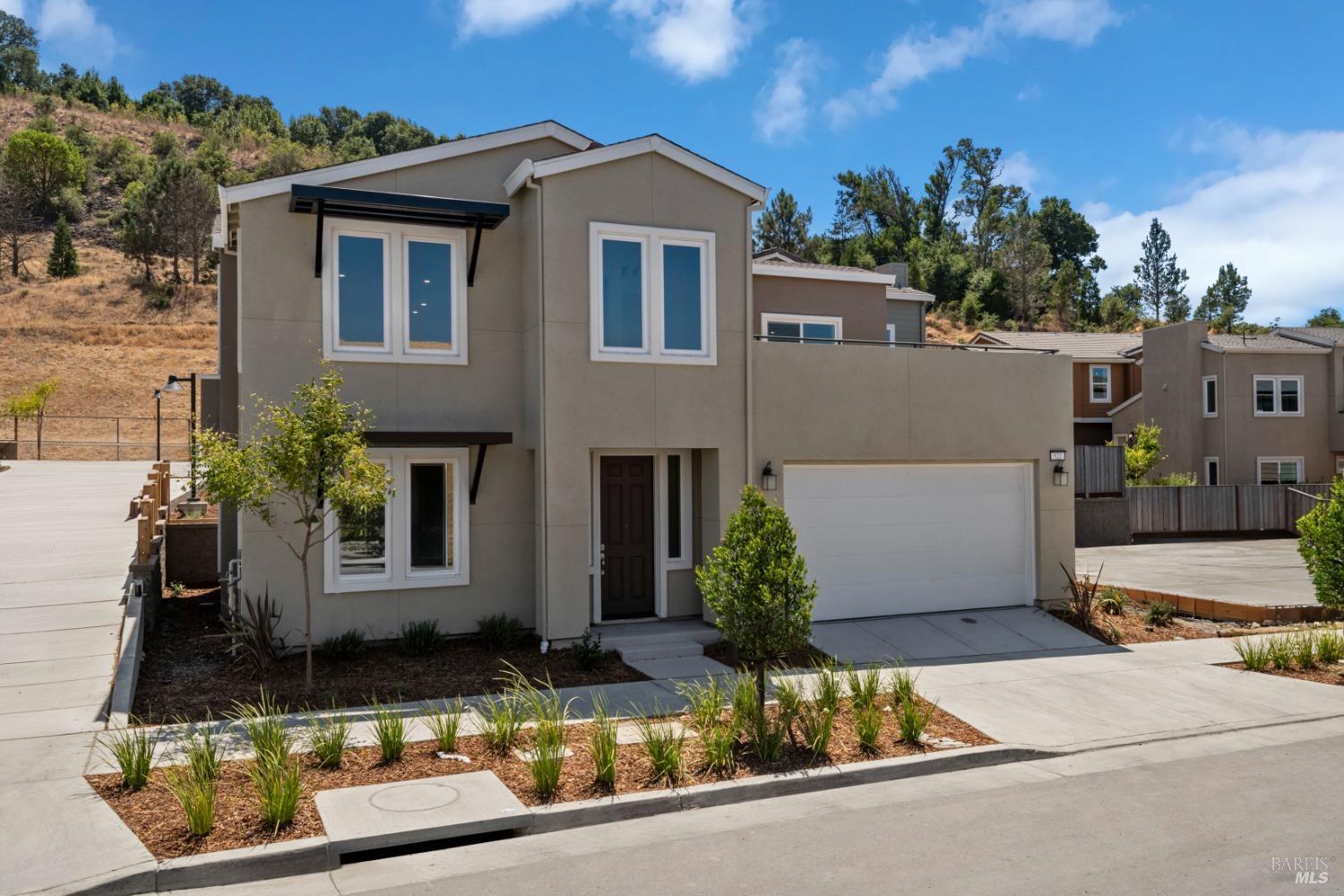 The Pinnacle of Comfort! This exquisite NEW home is part of the new Sterling Hills at Quarry Heights community. Enjoy beautiful hillside views overlooking the Petaluma River and Sonoma Valley. This prime commuter location is just 32 miles north of San Francisco, with easy access to US-101. Conveniently close to shopping and and charming, historic downtown Petaluma, the home features an open floor plan, kitchen pantry, and a kitchen island for added dining space, plus a roof deck perfect for entertaining. Designed for energy efficiency, this Energy Star® certified home includes an ecobee3 lite smart thermostat, WaterSense® labeled fixtures, a tankless water heater, and a Whirlpool® appliance package. Experience the perfect blend of style, comfort, and convenience in your BRAND NEW dream home.