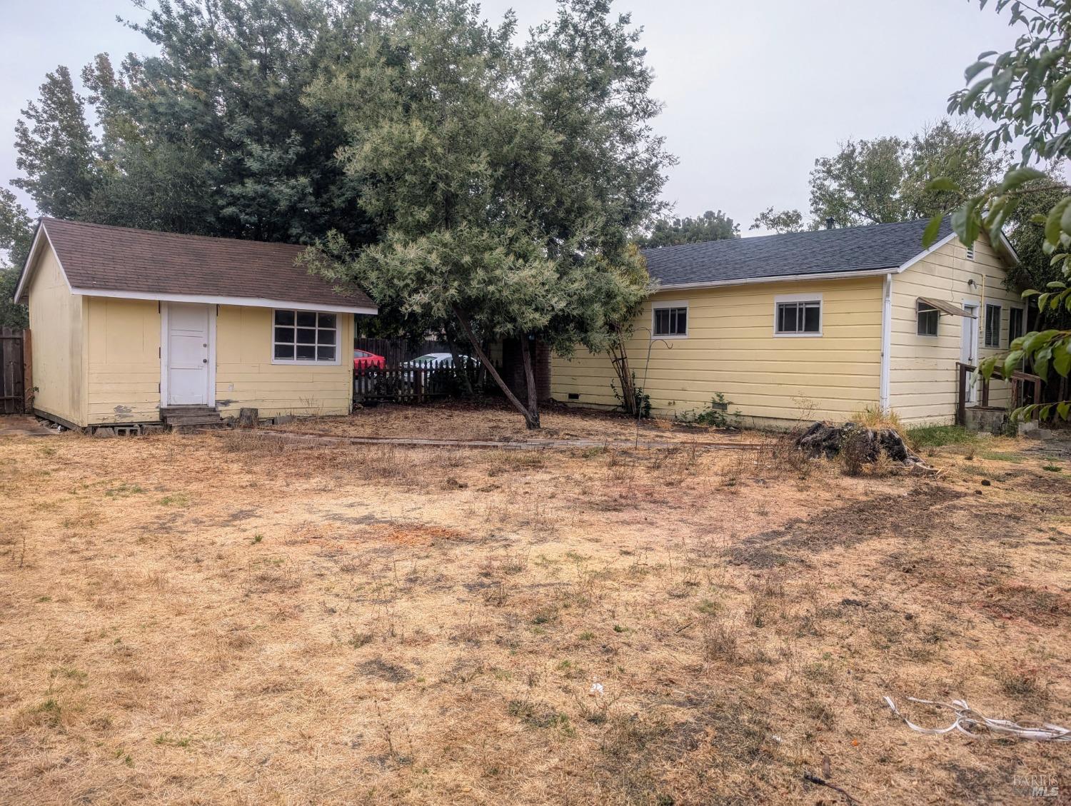 Loads of potential in a charming neighborhood near Healdsburg High School. New Roof on the 2 bedroom 1 bath home with laundry/mud room, installed 2023