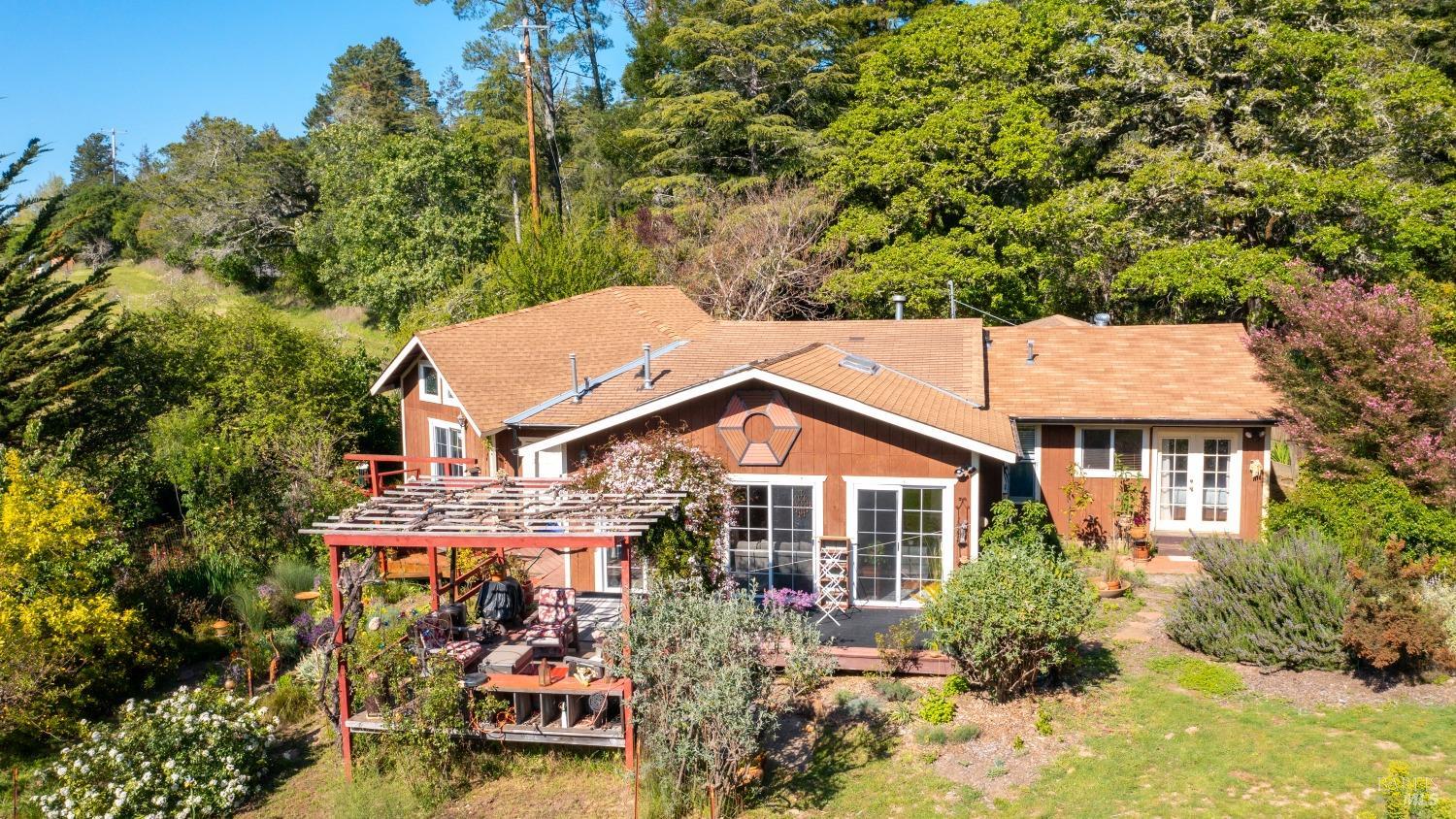 790 Tilton Road Sebastopol, California Unique and very special 2.65 acres in prime Sebastopol country! 15 miles to the ocean. Main house has an attached studio, there are (4) He/She sheds and (1) art studio. (4) 100' raised planter beds with it's own water storage tank for watering. (2) seasonal creeks. North side of property is lined by a organic apple orchard. Owner is a master gardener and the property shows all her imagination and hard work. Gardens face the west. There are many fruit trees including pear, apple, plum. kumquat and persimmons. Small pond is located outside the pergola and above the Redwood Grove. 11.5 GPM
