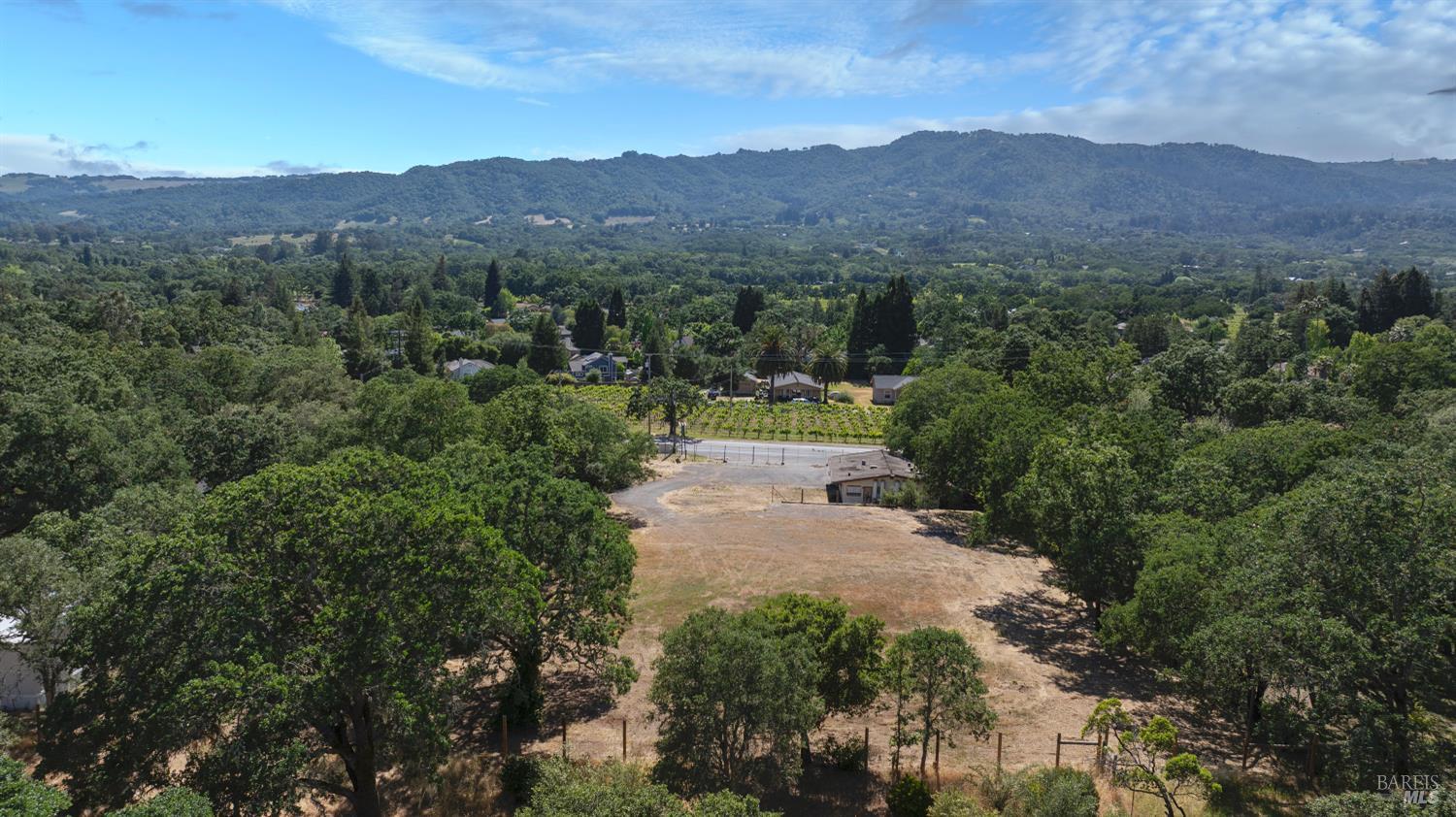 Rare Opportunity - Over 1 Acre with Views, and Potential!  Discover this exceptional property offering over one acre of usable land with public utilities. Enjoy sweeping views of the western mountains and nearby vineyards, creating a serene and picturesque setting.  The property includes a mid-century building from the 1960s, ready for repair or transformationideal as a starting point for your dream estate. Architectural plans for a new custom home and a remodel of the existing structure are available, making this a prime opportunity for builders, investors, or anyone seeking space to create their perfect retreat.  Locale is commute-friendly. Whether you're looking to build new or restore character, this is a fantastic chance to secure a property with vision and value.
