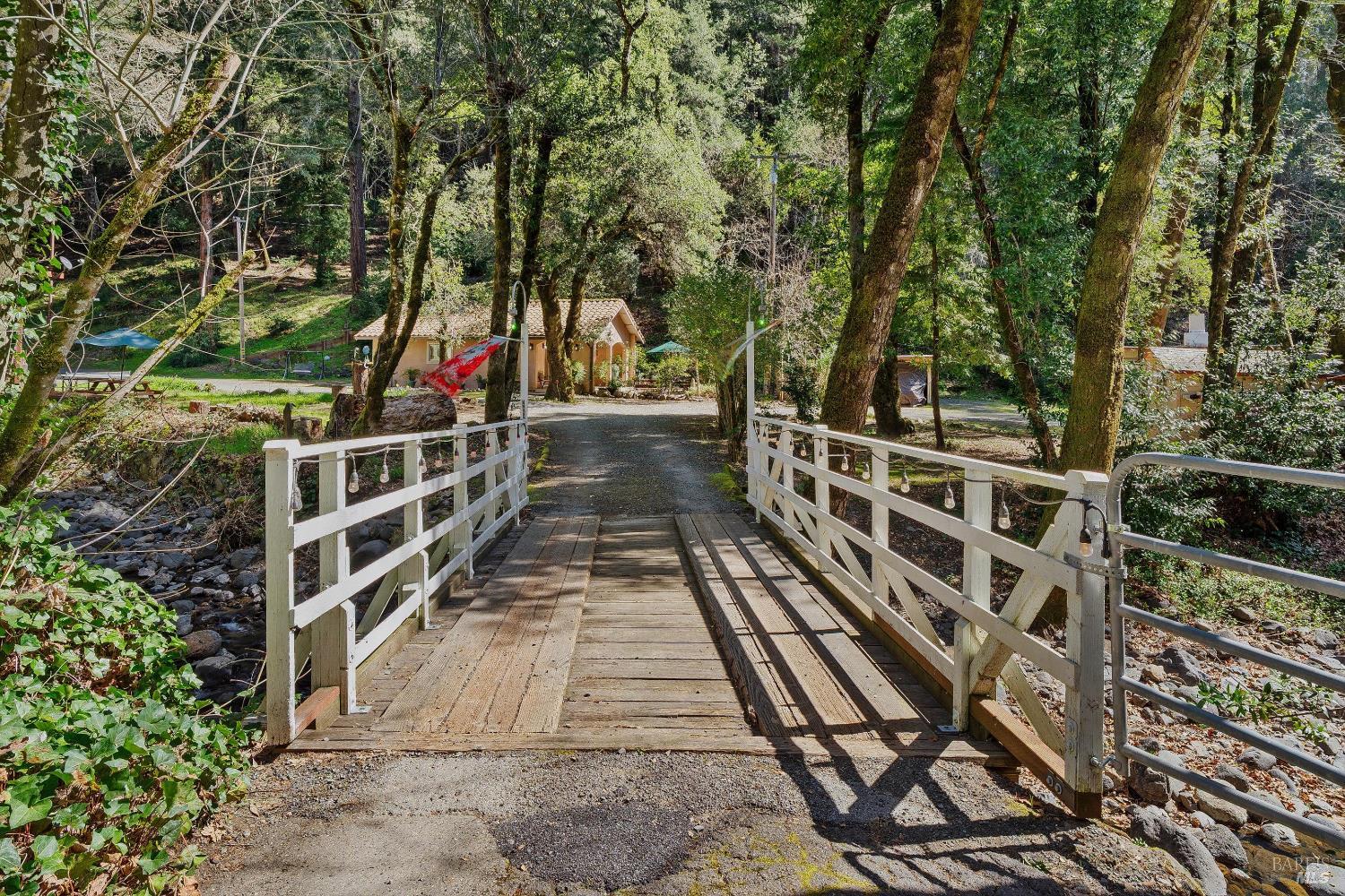 Welcome to this charming single-story home on Calistoga Road in Santa Rosa, nestled along the serene Hummingbird Creek. Enjoy the soothing sounds of the creek right from your front porch. The home features original knotty pine accents that add a touch of warmth and character. Set on a private 7-acre lot with a picturesque hiking path, this property also includes a fairly new detached studio ADU, perfect for guests or rental income. Don't miss out on this unique blend of tranquility and convenience!