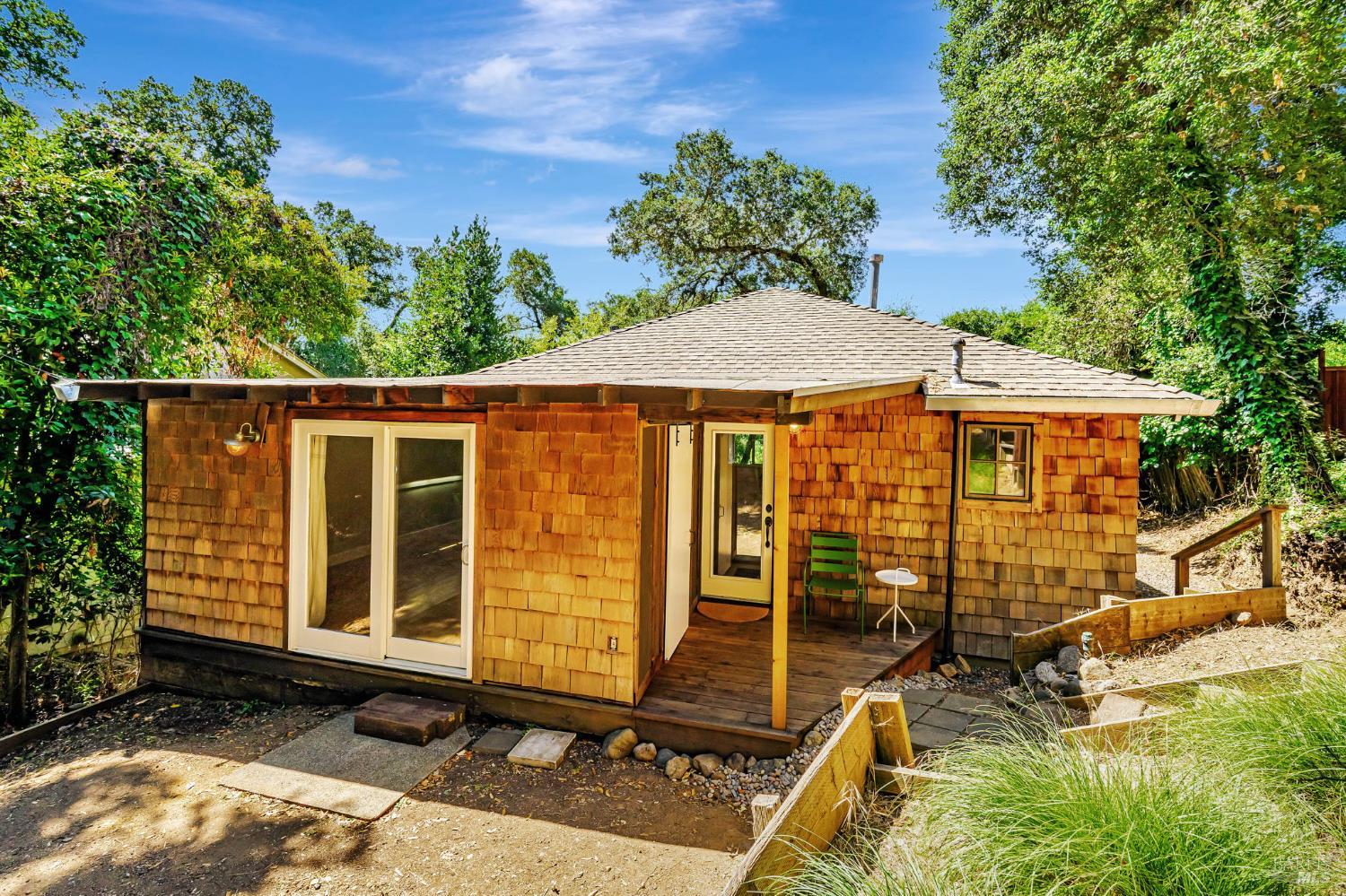 2160 Madrone Avenue Healdsburg, California Welcome to 2160 Madrone Avenue, a beautifully updated property tucked away in a peaceful Fitch Mountain neighborhood, just minutes from downtown Healdsburg. This rare duplex opportunity offers immediate comfort and exciting possibilities. The main level features a move-in ready 2-bedroom, 1-bath unit with modern flooring, dual-pane windows, and a refreshed kitchen and bathroom that blend comfort with contemporary design. Outside, enjoy a renovated two-car parking deck and upgraded septic for long-term peace of mind. The lower unit is framed and ready for your vision, ideal as a guest suite or expanded living space. With duplex status on tax records and private river beach access in Camp Rose, this property offers an exceptional lifestyle with the added benefit of rental income potential. A rare opportunity to own on iconic Fitch Mountain, loved for its natural beauty, rich Bay Area resort history, and timeless allure.