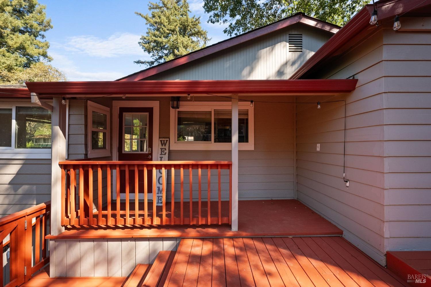 2756 N Fitch Mountain Road Healdsburg, California I am delighted to present this home in the heart of wine country, offering an exceptional blend of modern updates and convenient location. This home updated with new flooring throughout,enhancing its contemporary appeal.The newly remodeled high-end bathroom features dual sinks and a spacious walk-in shower with two shower heads,providing a luxurious experience. The kitchen is designed for both functionality and entertainment.Its thoughtful layout allows seamless interaction with guests in the living room and exterior entertaining area, making it ideal for gatherings.The master suite boasts a sliding glass door that opens directly to the outdoor area, blending indoor and outdoor living effortlessly. The property shines with an oversized tri-level deck, perfect for entertaining or simply relaxing in the sun.This deck is ideal for enjoying the sun's rays from morning until evening. Uniquely this home includes a one-car garage with plentiful additional parking available in front of the house. This property is located, just moments away from the vibrant downtown Healdsburg, the picturesque Russian River w/ Del Rio River access, and renowned restaurants and wineries.The neighborhood provides a warm, community feel, enhancing your overall living experience.Use 2756 Del Rio Wood in maps
