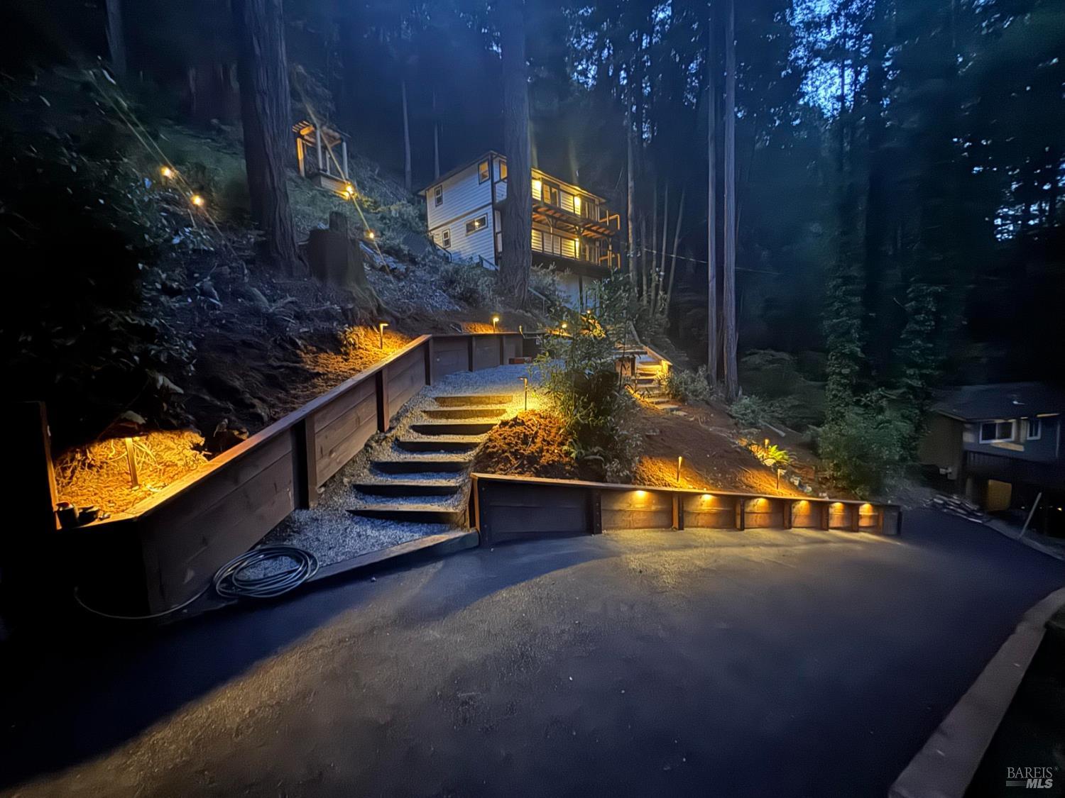 14150 Fern Road Guerneville, California Recently renovated Guerneville retreat just 0.5 miles from downtown, river access, shops, and cafes. This stylish 3BD/3BA home offers a flexible layout ideal for guests, dual living, or creative use. Upstairs features a bright open-concept kitchen with quartz waterfall counters, custom redwood shelving, and updated appliances. The primary suite includes a walk-in closet and ensuite bath, with a guest bath in the main living area. Downstairs, a separate entrance leads to two bedrooms and a full bathperfect for privacy or hosting. Fully updated systems include new plumbing, electrical, siding, windows, insulation, and multi-zone ductless HVAC. A finished storage space, low-maintenance landscaping, and terraced garden beds enhance the outdoor experience. Ample off-street parking includes space for a boat or RV, with exterior power ready for potential EV conversion. Located on a quiet, dead-end street with public sewer and water, and out of the flood zone. Own Your Dreams!
