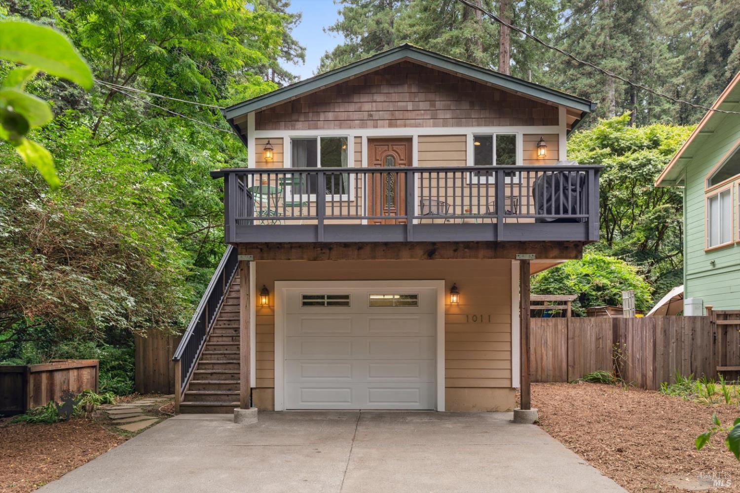 Rare opportunity to own a meticulously maintained home in the beautiful and highly sought-after community of Villa Grande, a hidden gem nestled along the scenic Russian River. Built in 2007, this bright and airy 2 bedroom, 2 full bathroom residence offers an exceptional living experience, situated entirely on the second floor above an expansive garage, creating a serene "treehouse" feel.  The open layout and cathedral ceilings give a sense of spaciousness, welcoming abundant natural light. A deck off the kitchen is perfect for grilling while you soak in the picturesque surroundings. Unwind in the yard under the stars in your large hot tub. The oversized garage comfortably accommodates your laundry area, vehicles and all your outdoor adventure gear. Direct access to the Russian River is available through the nearby Patterson Point Preserve, ideal for swimming and kayaking. This lovely property is ready for you to move in, put down your things, and make it your home.