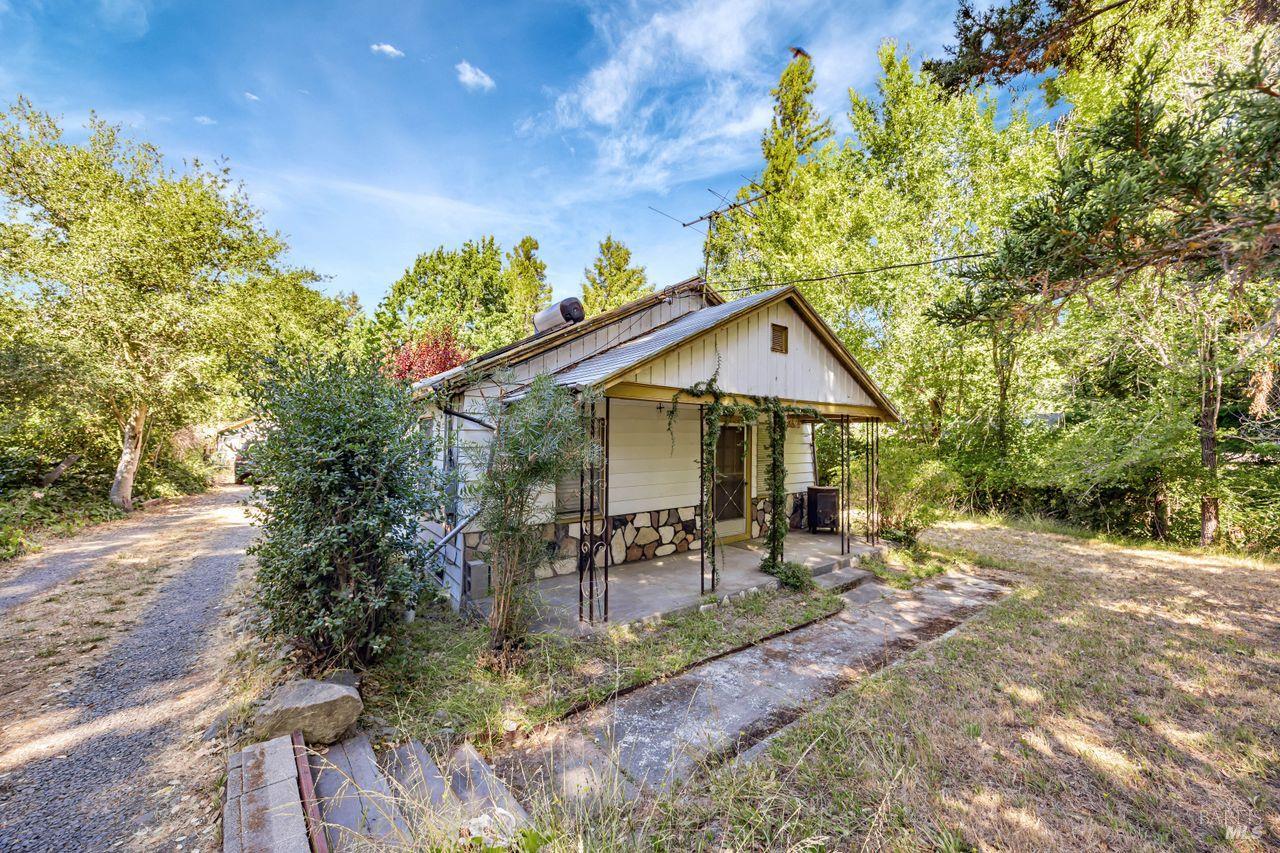 Country charm meets city convenience in this rare Sebastopol opportunity! Tucked behind a private gate, this enchanting 2BD/1BA vintage cottage offers a peaceful, rural vibe just minutes from downtown. Set on a deep, usable .91-acre lot with a seasonal creek, this property features newer laminate flooring, a durable metal roof, public water, and a septic system. Enjoy your morning coffee on the classic front porch or explore endless possibilities with the detached 2-car garagecomplete with loft spaceand a separate shed for storage or hobbies. Love the land? Check with the city about the exciting potential to build a second home. Whether you're gardening, relaxing, or creating something new, this unique property offers the space and setting to make it yours. A truly special blend of nature and neighborhood livingdon't miss it!