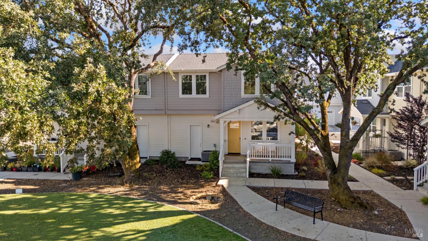 Welcome to this charming and efficiently designed home offering approximately 1,298 sq. ft. of living space. The main level features an open-concept living and dining area, a modern kitchen with stainless steel appliances, a slightly larger upgraded island, and a convenient half bath. Upstairs, you'll find three comfortable bedrooms, including a primary suite, along with two full bathrooms. A welcoming front porch overlooks peaceful greenspace with majestic oak trees, while the private back patio is ideal for morning coffee or relaxing in the evening. Situated on a premium lot with no homes directly in front, this property offers an added sense of privacy and space. With an attached garage, nearby community parks, and close proximity to shopping and dining, this home combines comfort, convenience, and easy living.