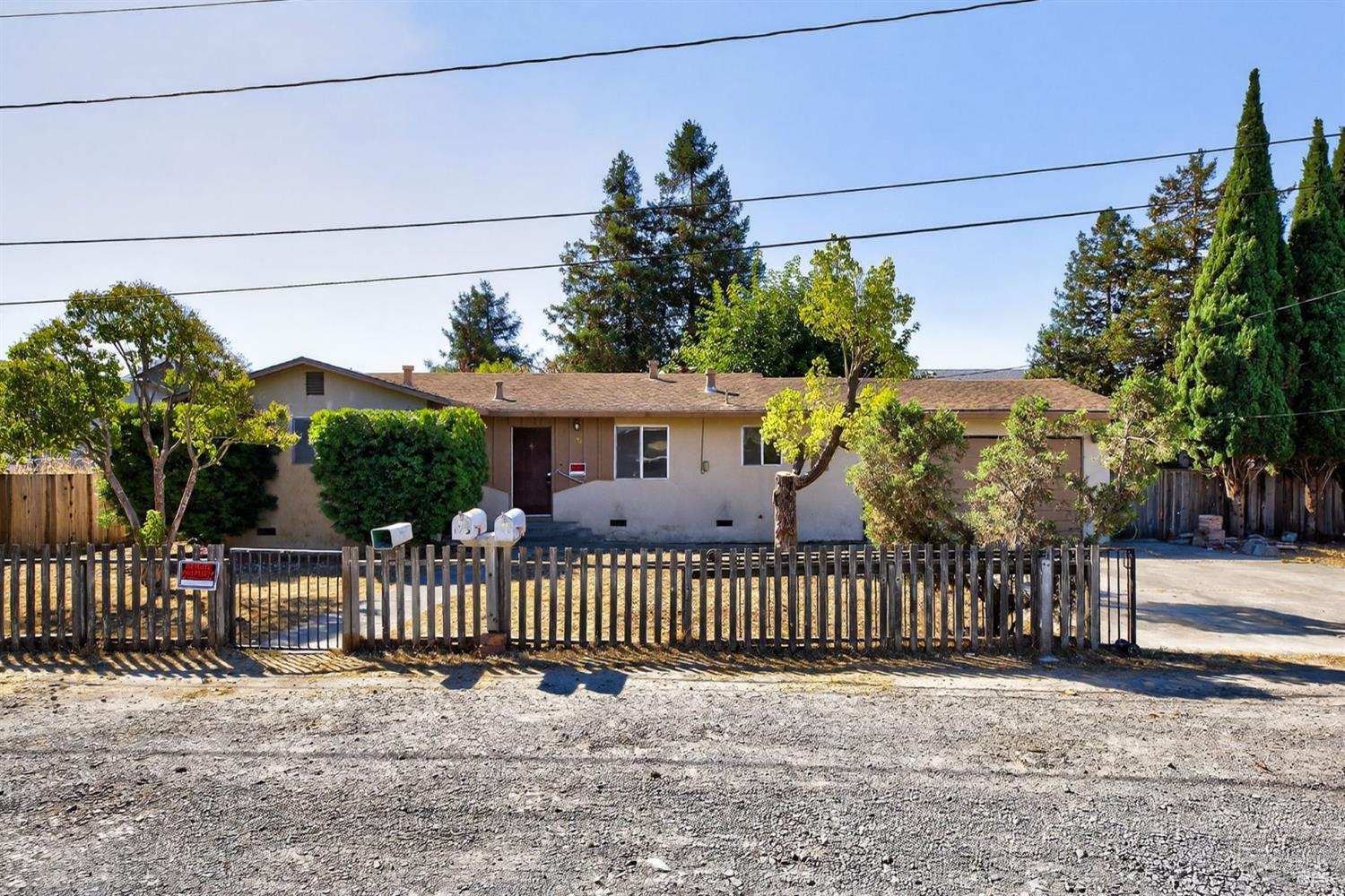 Charming fixer opportunity! This 3-bedroom, 1.5 bath home offers 1,218 sqft of living space on a spacious third-acre lot, tucked away on a private road. With plenty of room for small animals, gardening, or outdoor projects, this property is brimming with potential. A perfect opportunity for those ready to bring their vision and creativity to life!