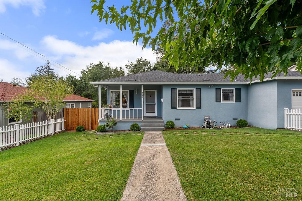 Adorable and full of charm, this single level 3-bedroom, 1-bath home is nestled in the desirable Lower Hidden Valley neighborhood. Thoughtfully cared for over the years, it features lovely original details and a warm, inviting feel throughout. Enjoy a huge backyard with a peaceful seasonal creek, perfect for relaxing or entertaining. A large shed offers extra storage or creative space, and the classic white picket fence adds to the home's timeless appeal. This is a truly special home in a wonderful location.