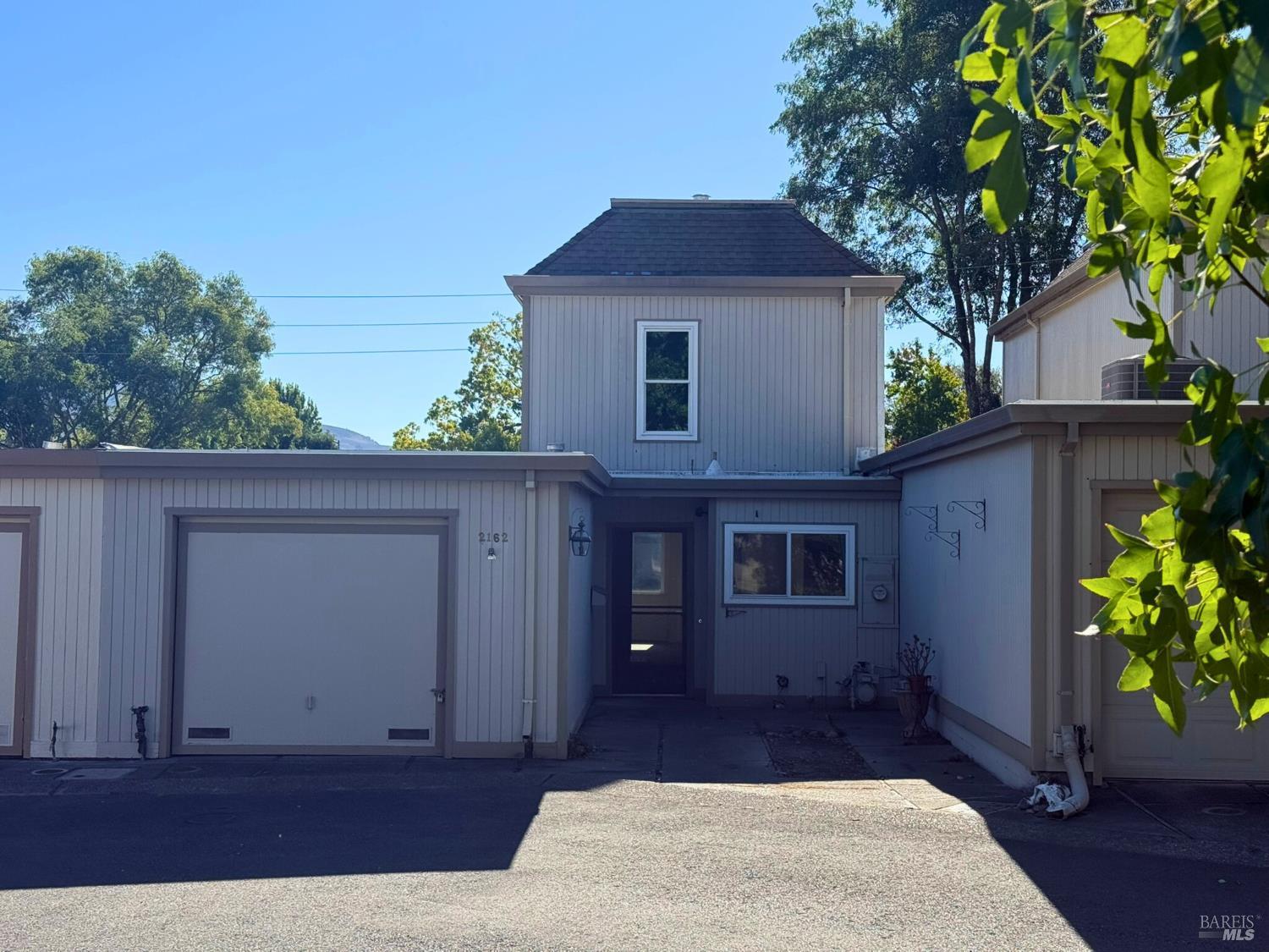 Looking for a project? Here it is! Fantastic location in the desirable Bennett Valley Knolls community. This PUD fixer sits on a quiet cul-de-sac and offers a great floor plan with tons of potential. The layout features two bedrooms and one full bath upstairs, plus a bedroom and full bath downstairs. Enjoy a spacious dining area, comfortable living room with fireplace, and a cozy kitchen with pantry. Slider off living room opens to a cute patio. Laundry hookups are in the one-car garage, which has interior access.  There's an additional parking space in front of the unit as well. Low HOA dues include grounds maintenance and access to the community pool. There's also ample guest parking throughout the complex. Conveniently located near excellent schools, golf, parks, and a variety of shopping and dining options. This is a great opportunity for an investor or buyer ready to update and make it their own.