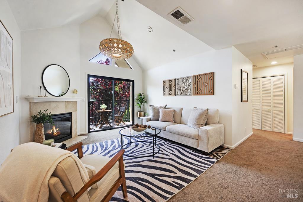 Enjoy this contemporary and charming upper-level condo, perfectly situated in the heart of Healdsburg!  Just a few blocks away from the downtown plaza with its variety of shops, tasting rooms, and acclaimed restaurants, yet tucked away from the bustle.  The open-concept living area features a vaulted ceiling, allowing an abundance of natural light.  Modern stainless appliances and classic granite countertops enhance the spaciously designed kitchen.  The bedrooms are distanced apart, with one bedroom and bath on each end of the unit.  The property benefits from a private one-car garage with storage space and a designated outside parking spot.  Amenities include a pool, patio, and community room, and the Foss Creek Pathway is nearby.  An ideal opportunity for anyone interested in a low-maintenance lifestyle or a vacation home getaway!