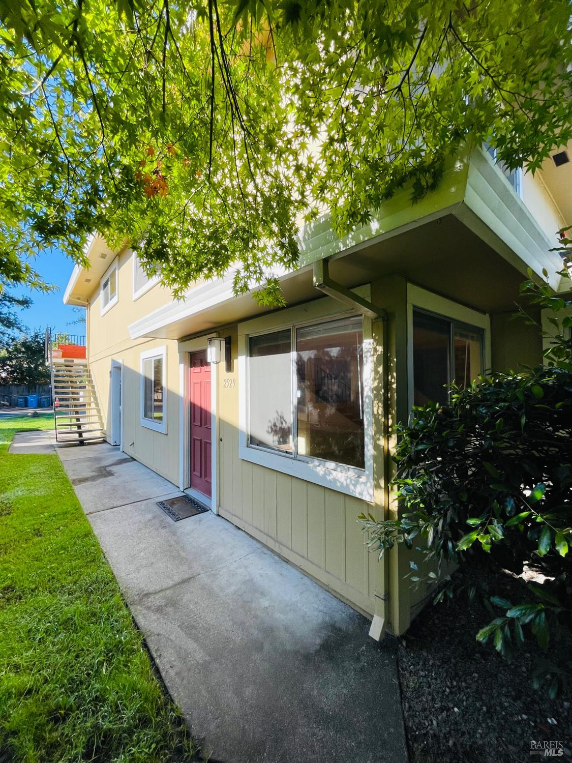 Welcome to Villa Rosa  A beautifully maintained community in the heart of Santa Rosa. This updated corner unit features a spacious layout with tile kitchen flooring, full-length cabinetry, and laminate floors throughout.    Enjoy a prime central location just minutes from Coddingtown Shopping Mall, Whole Foods Market, top restaurants, Highway 101, and the SMART Train Station for easy commuting.    The home includes a covered tandem parking area that accommodates up to three cars. Residents enjoy well-kept, tree-lined grounds with an inviting in-ground pool and clubhouse.    Perfect as a starter home or investment opportunity, this property offers a wonderful blend of comfort and convenience.    HOA covers: structure insurance, roof, trash, exterior maintenance, clubhouse and pool access, and grounds upkeep.