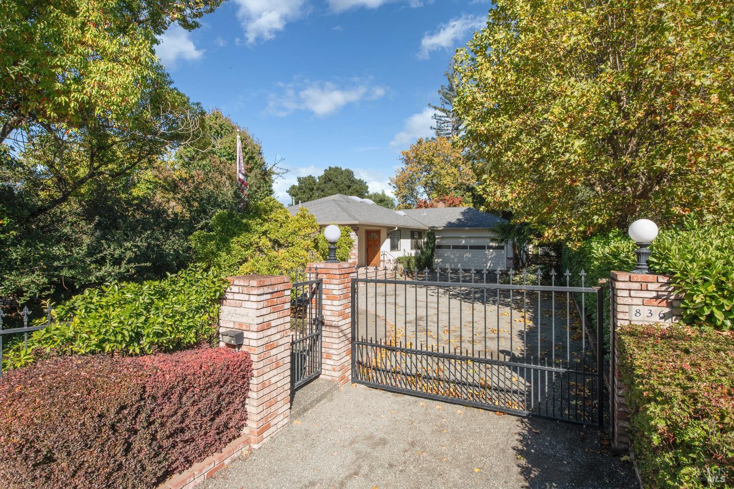 836 E Napa Street  Sonoma, California Eastside Sonoma Ranch-Style Home on Large Lot!   Located just six blocks from the Historic Sonoma Plaza, this traditional single-story ranch home sits on approximately 0.3 usable acre in desirable location. The spacious floor plan offers 2 bedrooms and 2 baths, plus guest quarters or a pool house perfect for visitors, extended family, or a home office.  The property features a beautiful, private yard with mature landscaping, an inviting in-ground pool, deck and outdoor kitchen, plenty of space for outdoor entertaining. There's ample room for RV parking, gardening, or other hobbies.  Outbuilding has great potential for art studio. Two-car attached garage and detached garage/storage space with separate entrance.  While the home is in need of updating, it offers tremendous potential for customization and expansion in an exceptional location. This is a wonderful opportunity to create your ideal Sonoma retreat just minutes from world-class dining, wine tasting, and the charm of the Plaza.